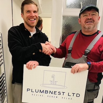 Professional handshake representing PlumbNest's commitment to quality service